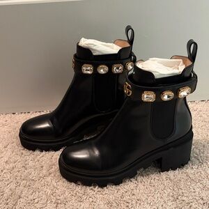 Gucci Black Ankle Boots with Gold Embellishments, brand new- worn once.